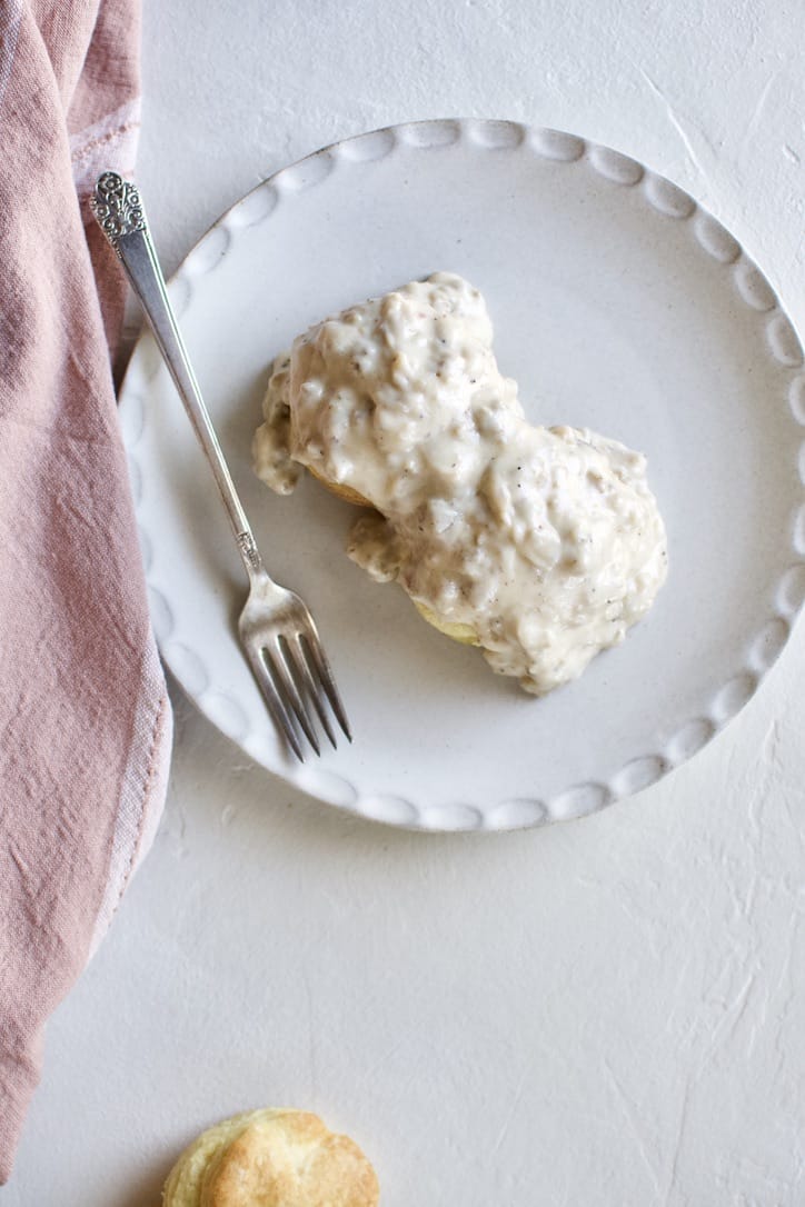 Joanna Gaines recipe for Classic Sausage Gravy on Jojo's Biscuits from the Magnolia Table Cookbook Vol. 1.