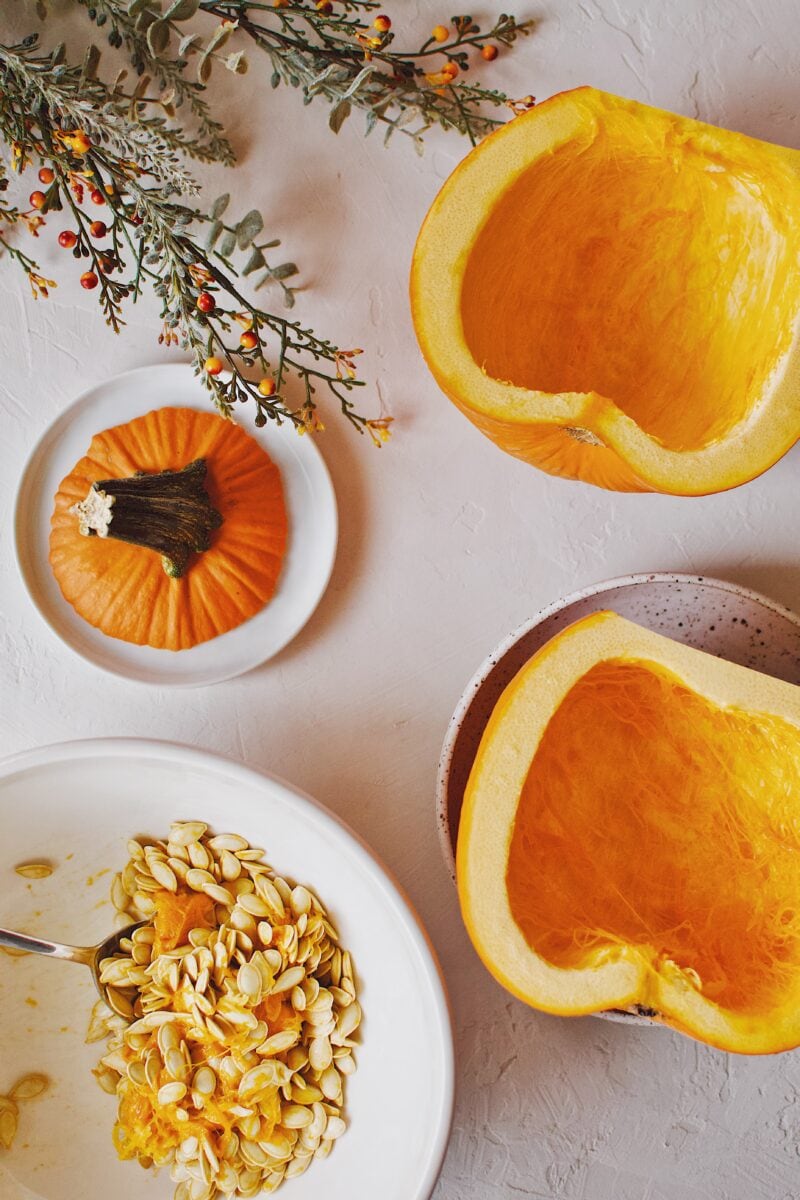 a sugar pie pumpkin halved and seeds removed.