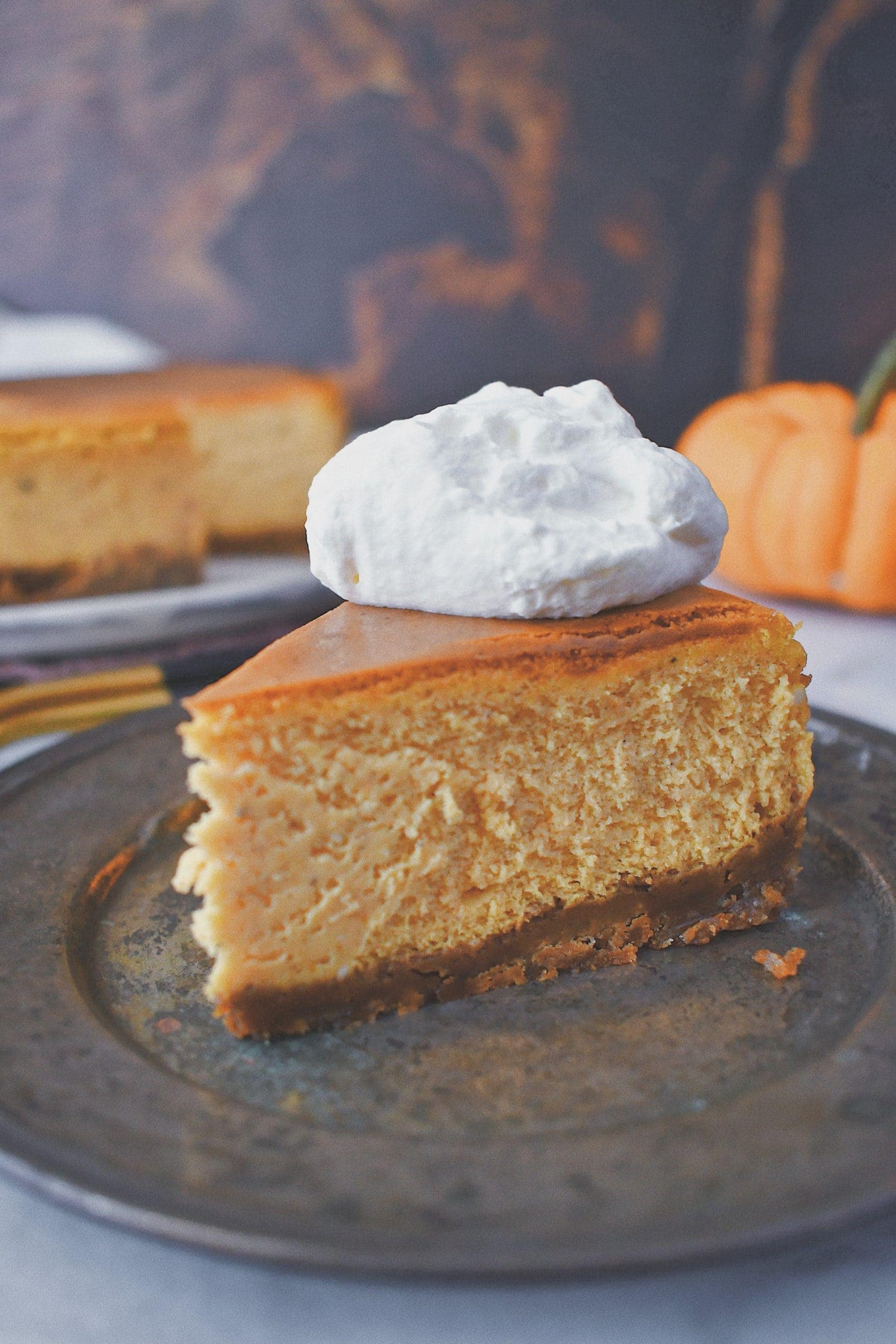 single slice of perfect pumpkin cheesecake