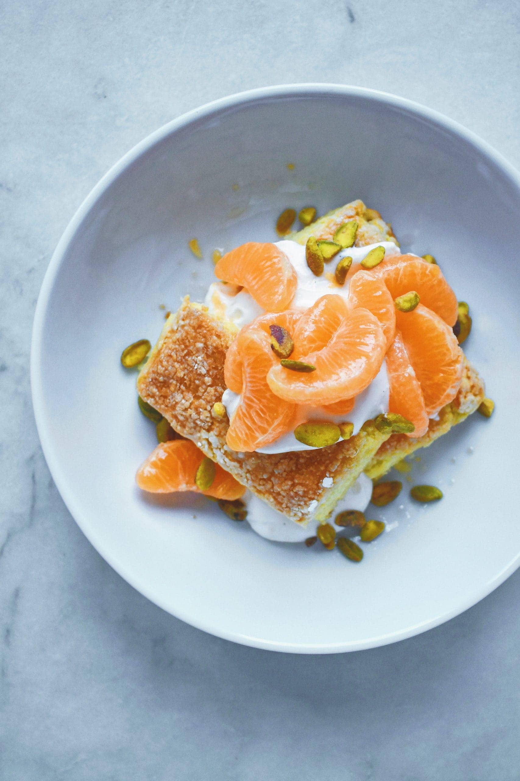 Clementine shortcake in a bowl, ready to eat.