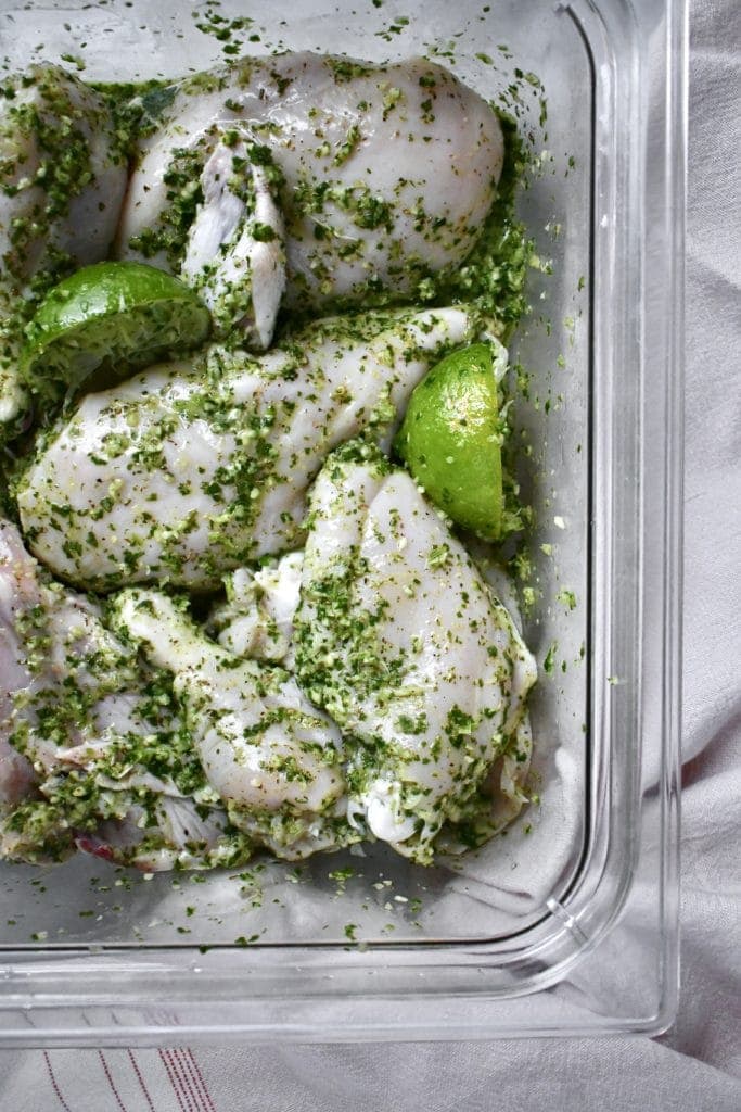 Chicken marinating in lime and sofrito 