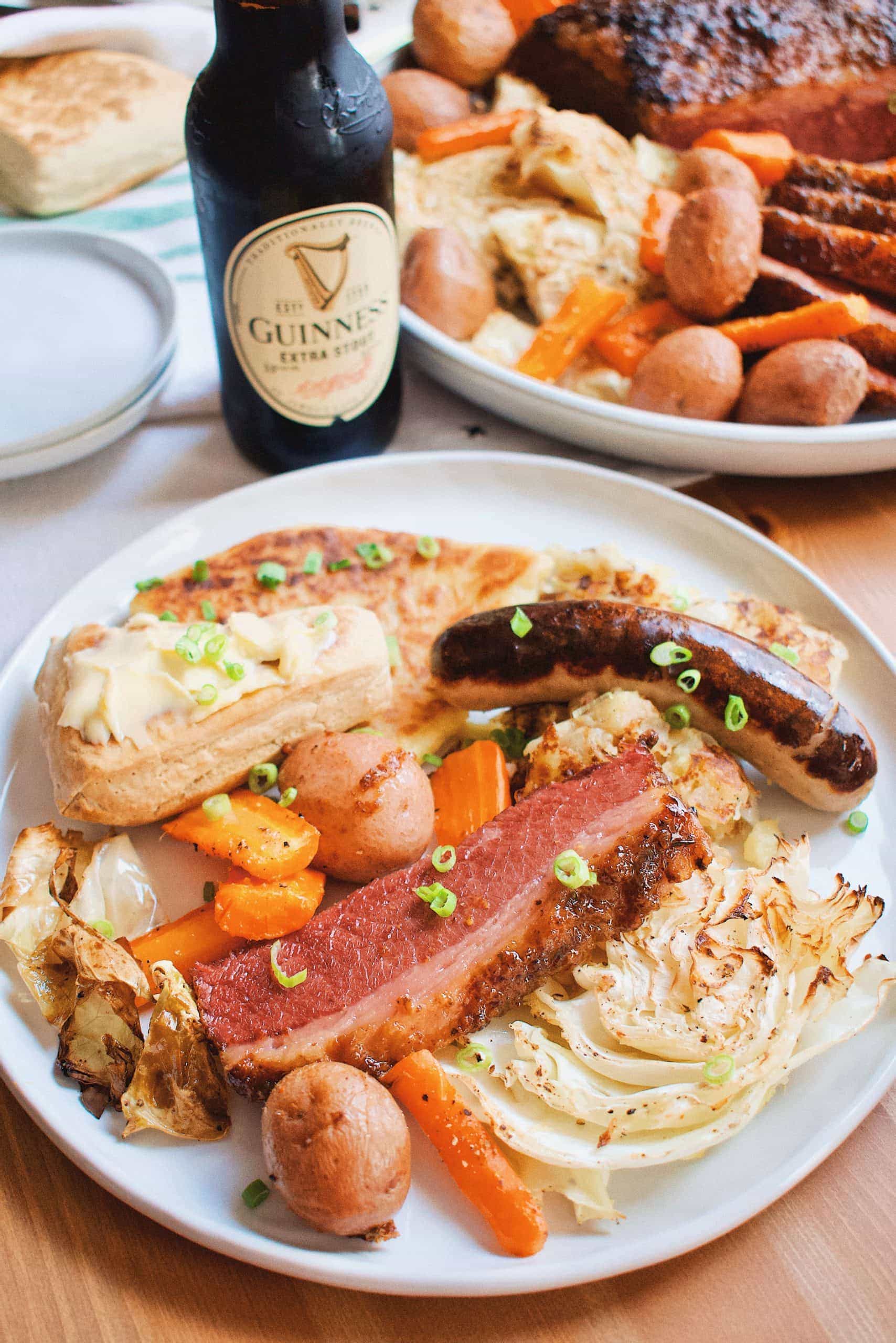 St. Patrick's Day Irish Feast with Corned Beef and Cabbage, Bangers, Colcannon, Soda Bread and Potato Bread.