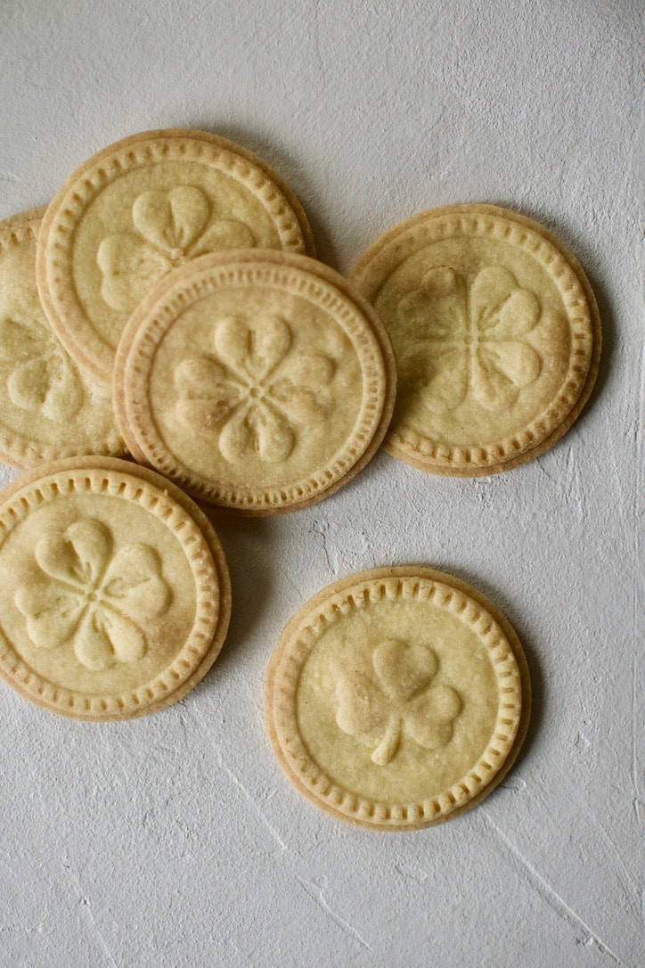 Irish Shortbread stamped with four-leaf clover and shamrocks on them.