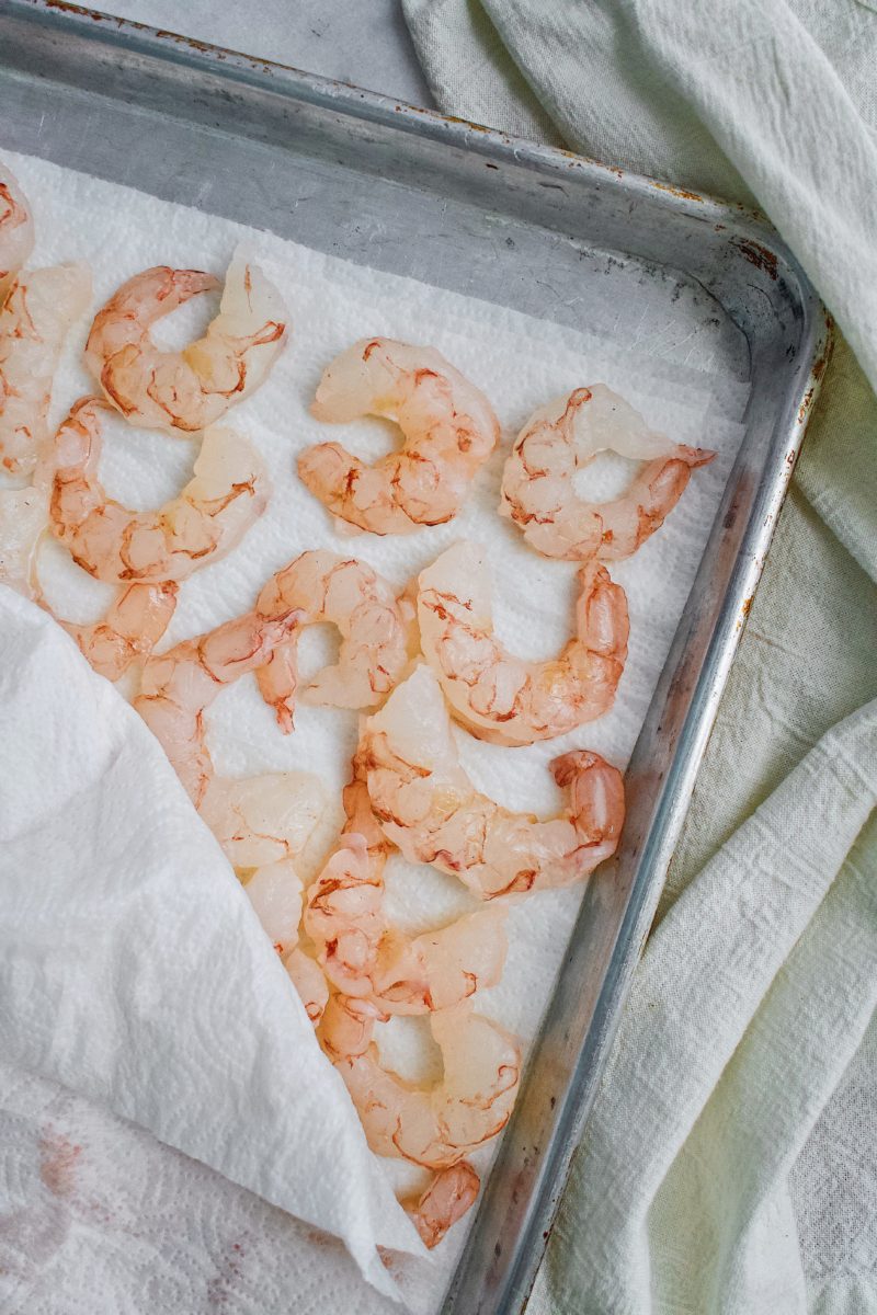 Thawed Shrimp drying between towels