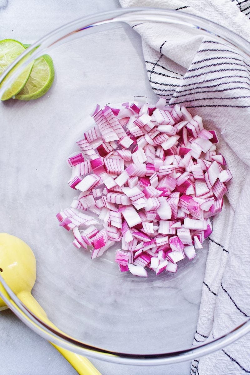 red onions marinating in lime juice