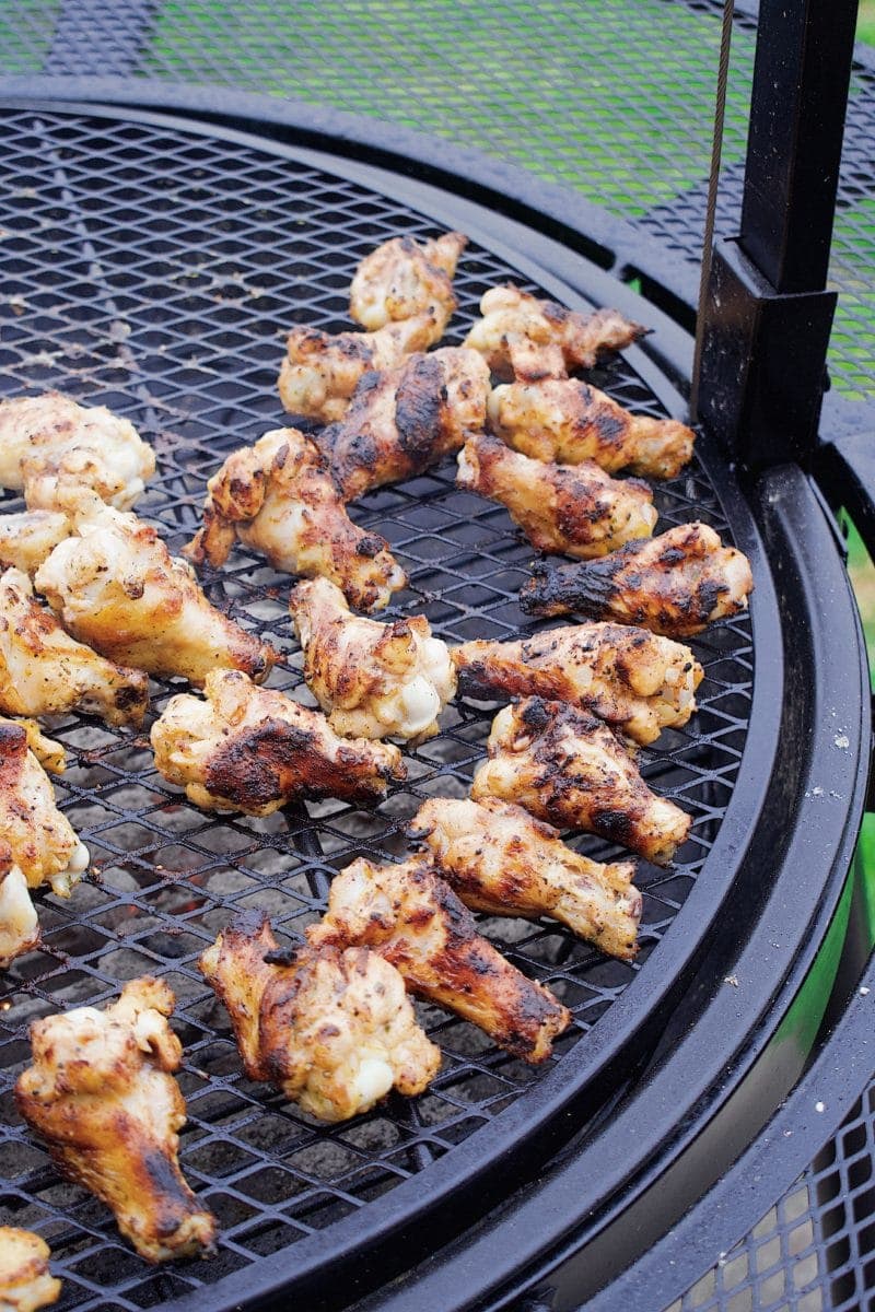 Chicken wings on the charcoal pit grill
