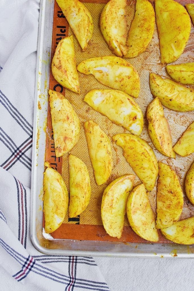 Turmeric coated potato wedges, before cooking