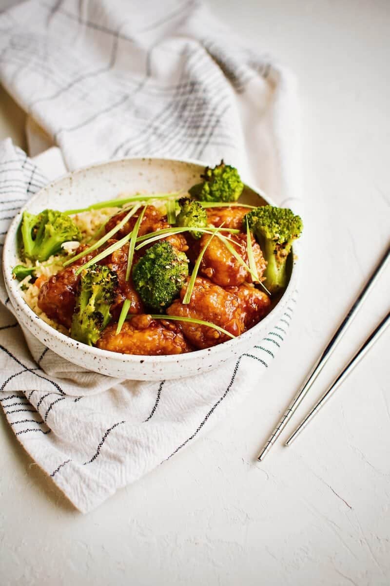 General Tso's Chicken served with fried rice and roasted broccoli