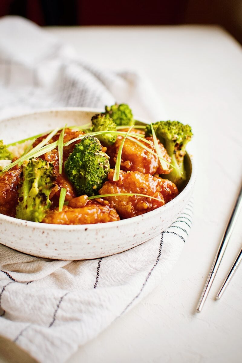 General Tso's Chicken served with fried rice and roasted broccoli