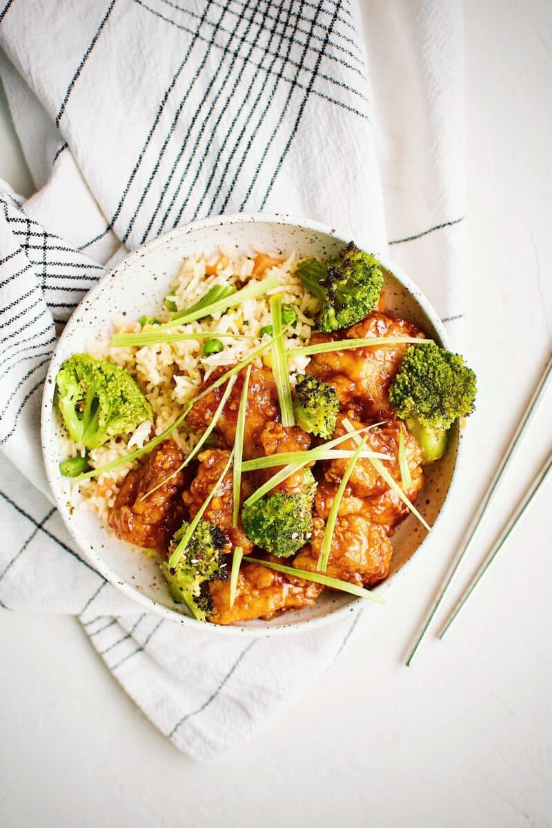 General Tso's Chicken served with fried rice and roasted broccoli