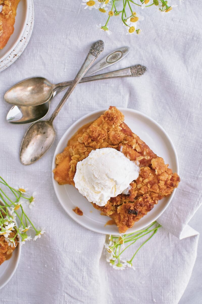 Spiced Peach Pie with ice cream on topSpiced Peach Pie with ice cream on top