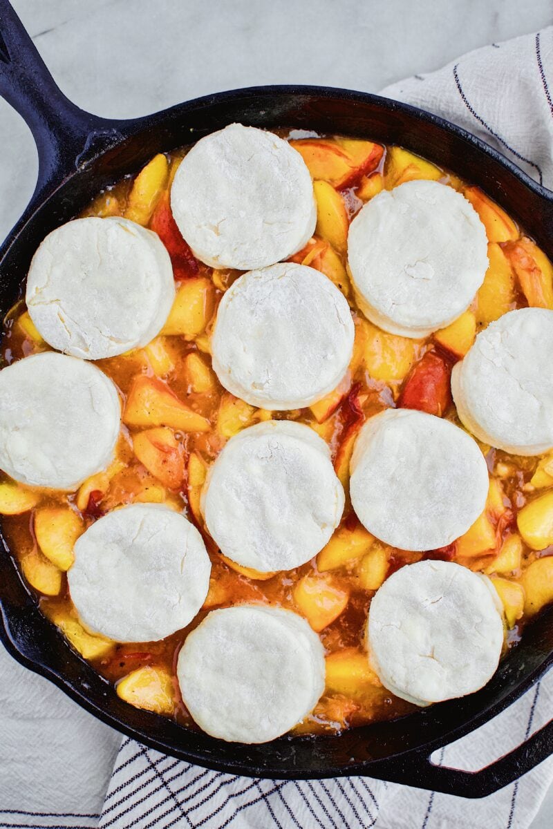 Skillet Peach Cobbler with Homemade Bisucits on top