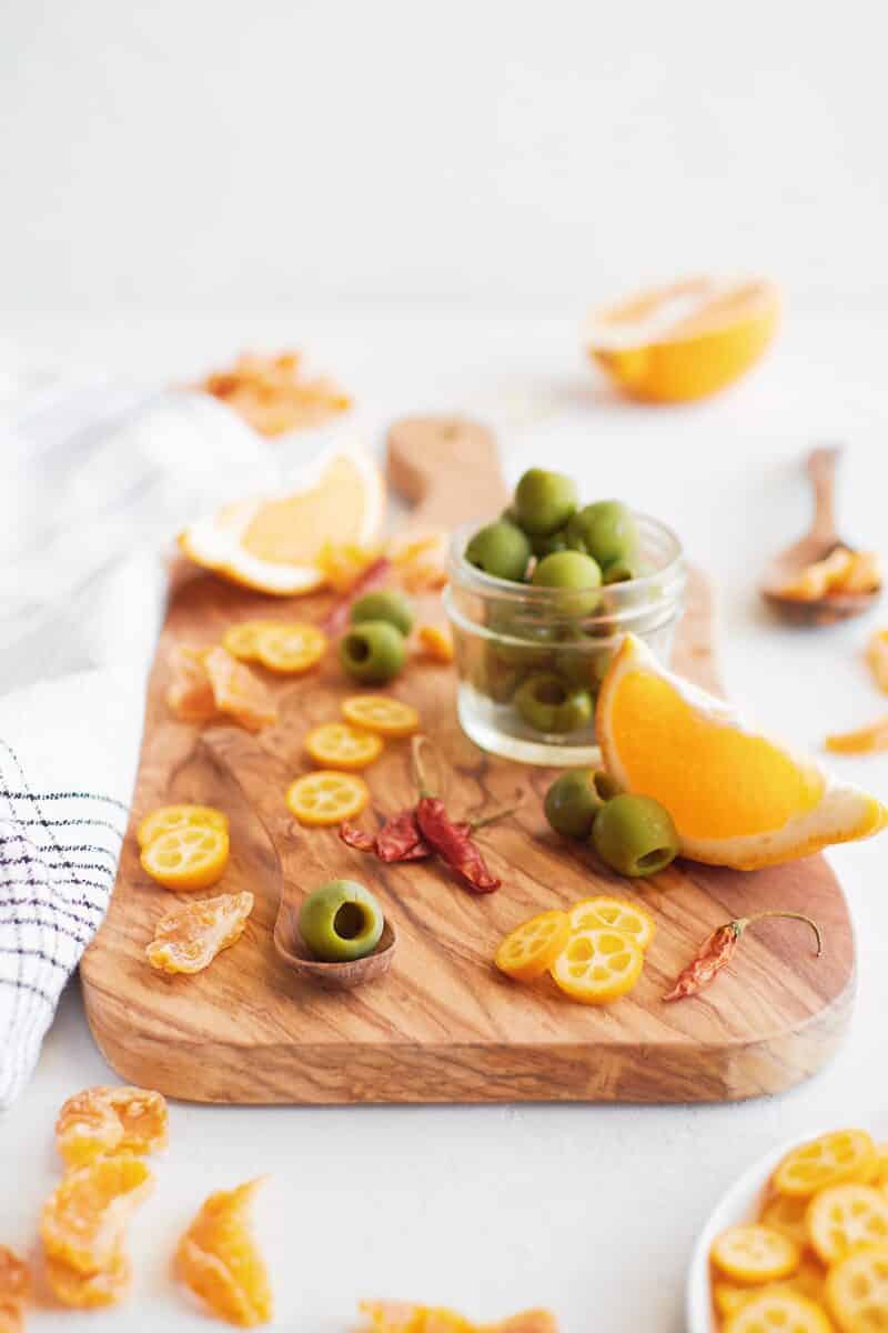 Ingredients needed for marinating olives with citrus and chiles