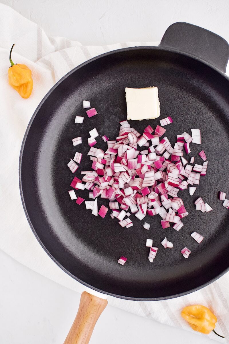 butter and onions in the pan ready to be cooked