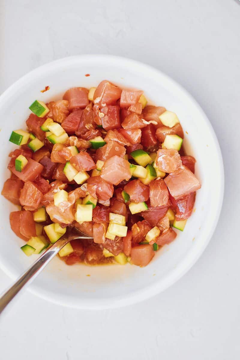 Tuna, cucumber, and poke marinade in a bowl