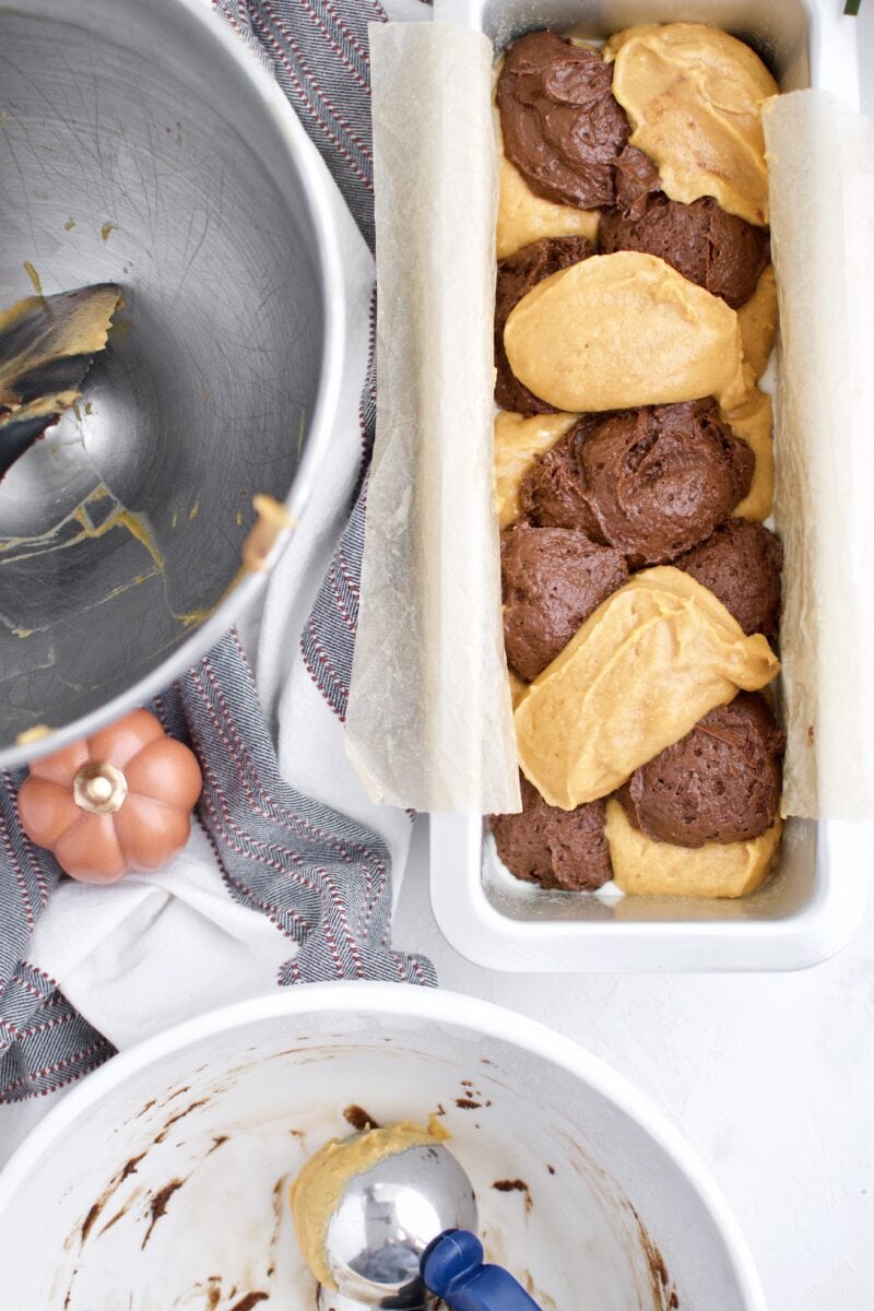 alternating batter dollops to form a swirl loaf