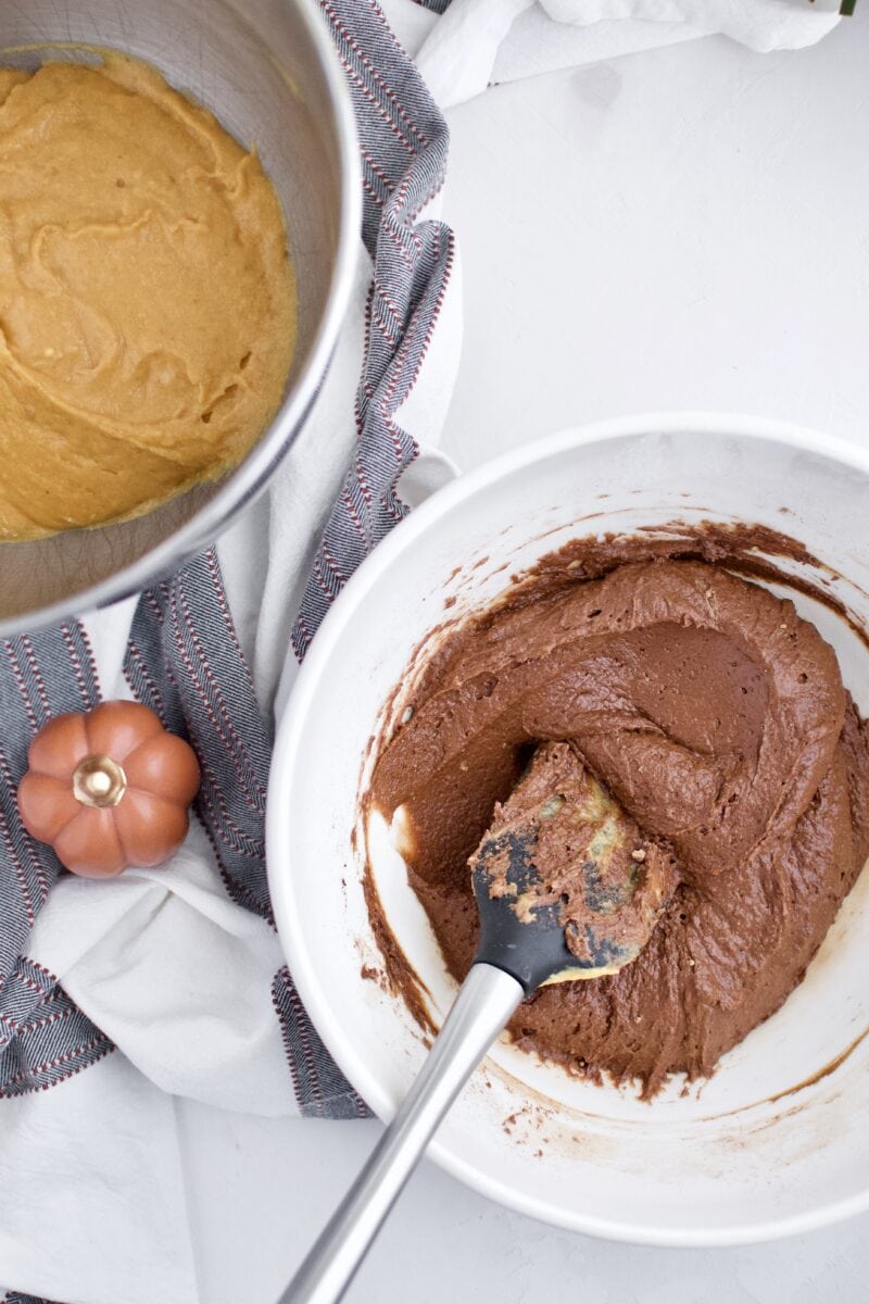 Half the mixture removed and cocoa powder folded in