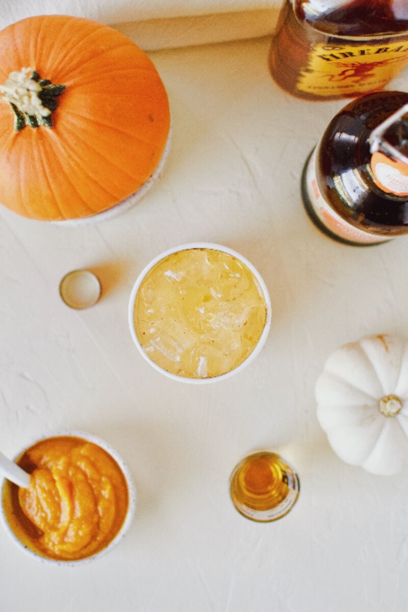 spiked sparkling pumpkin juice with pumpkin spice ginger beer and cinnamon whisky.