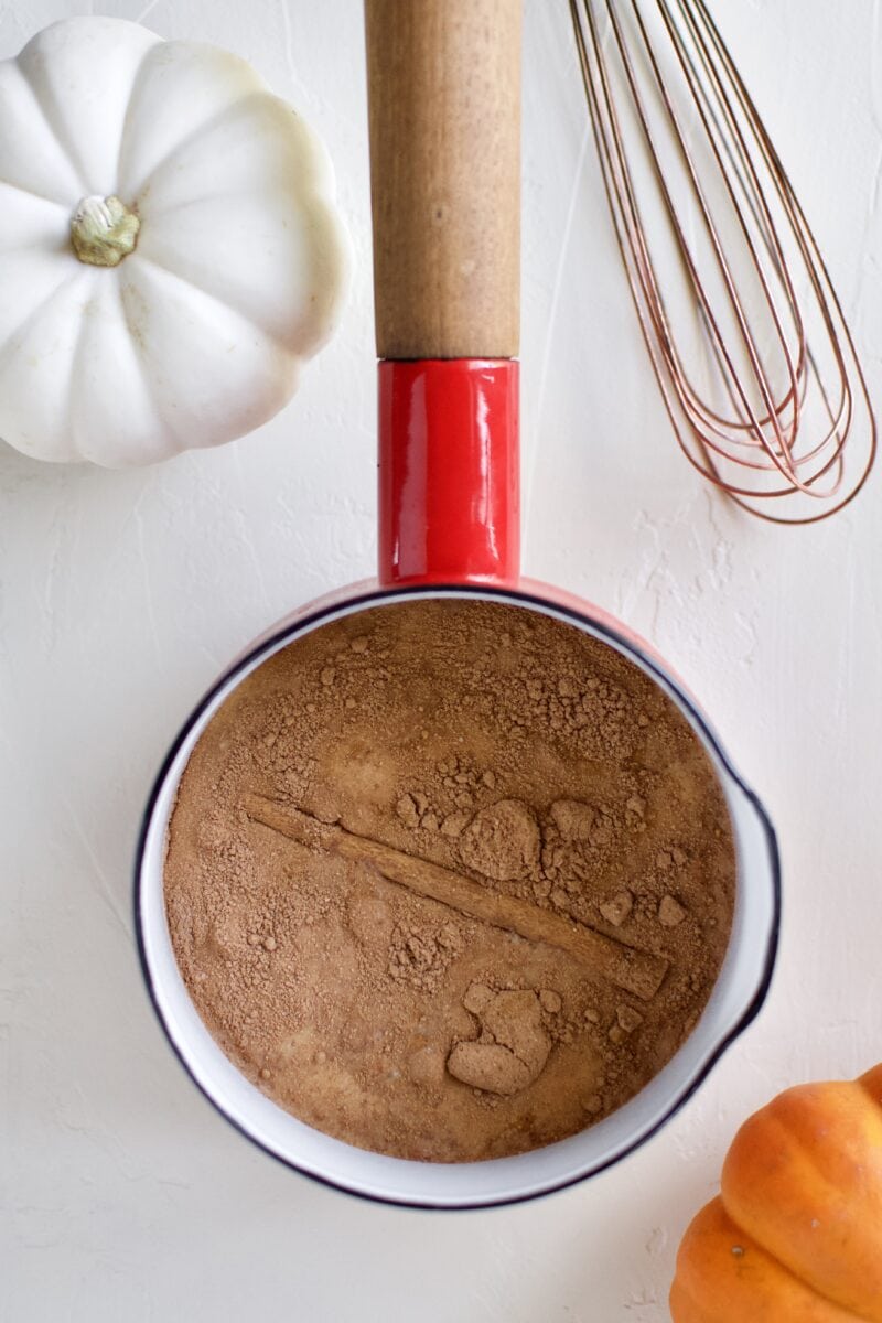 Pumpkin Spice Hot Chocolate ingredients in a saucepan