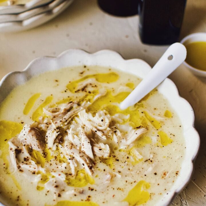 Greek Avgolemono Lemon Rice Soup in a white bowl ready to eat.