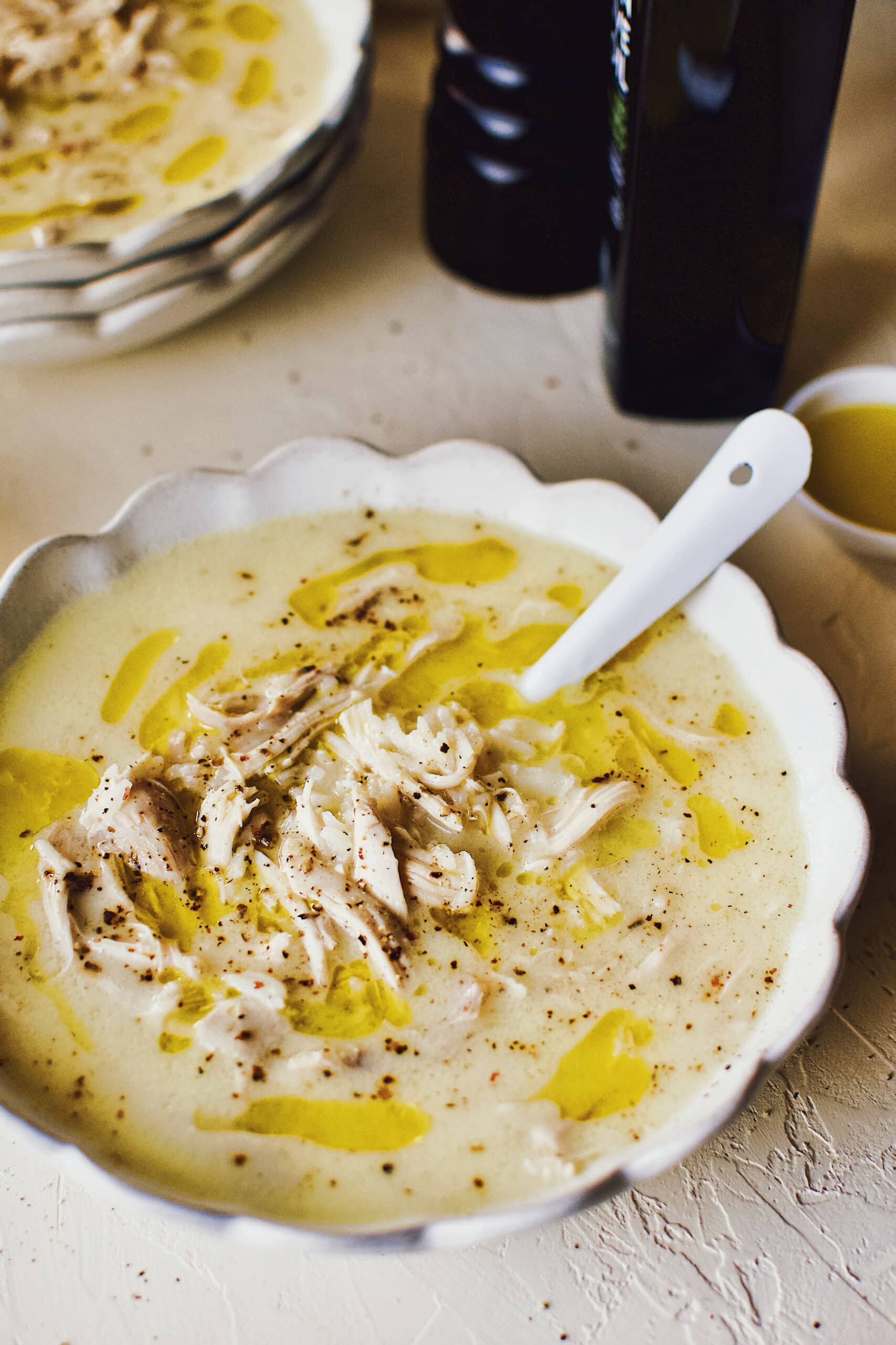 Greek Avgolemono Lemon Rice Soup in a white bowl ready to eat.