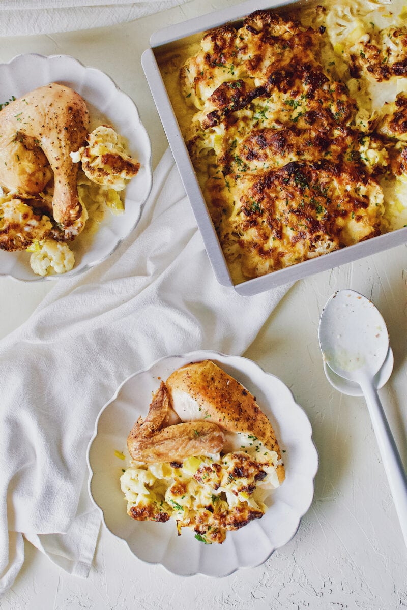 cauliflower and leek gratin served with a piece of roast chicken.