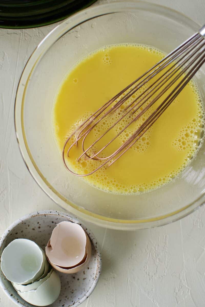 whisked eggs and lemon juice in a bowl.