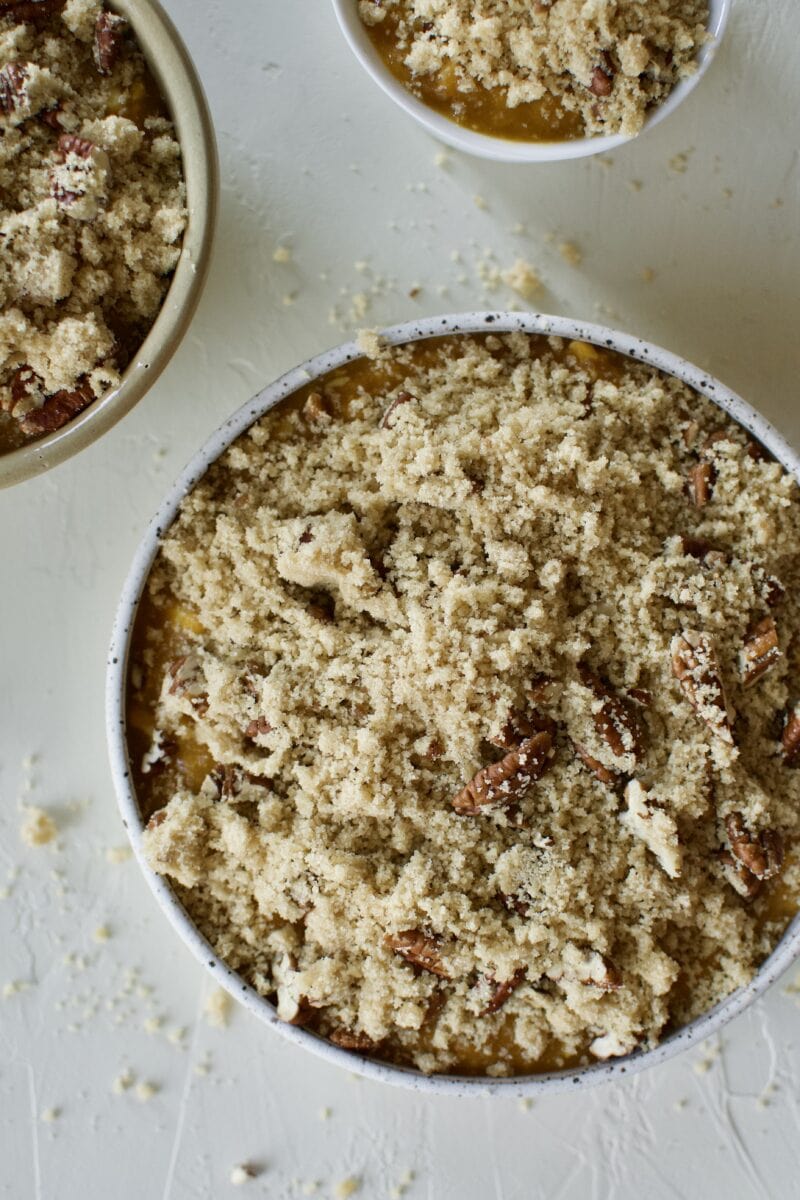 Place the sweet potato mixture in the casserole dish and top with the brown sugar crumble.