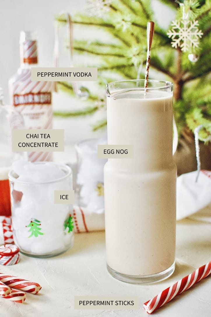 Peppermint Chai Eggnog Cocktail ingredients laid out on a table.