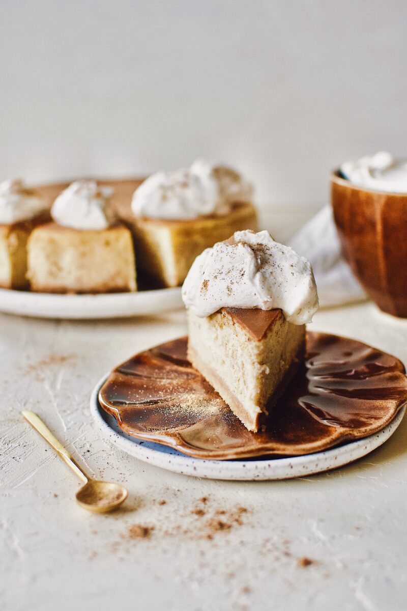 Chai-Spiced Cheesecake slice on a plate ready to eat.