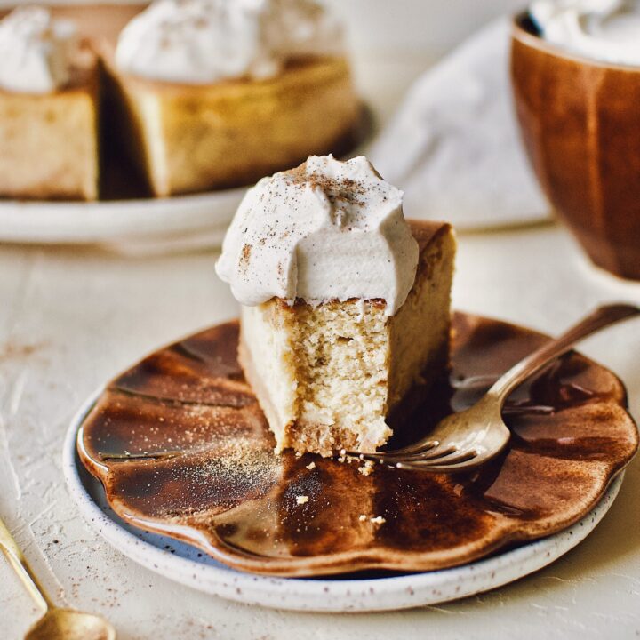 Chai-Spiced Cheesecake with a bite taken out of it.
