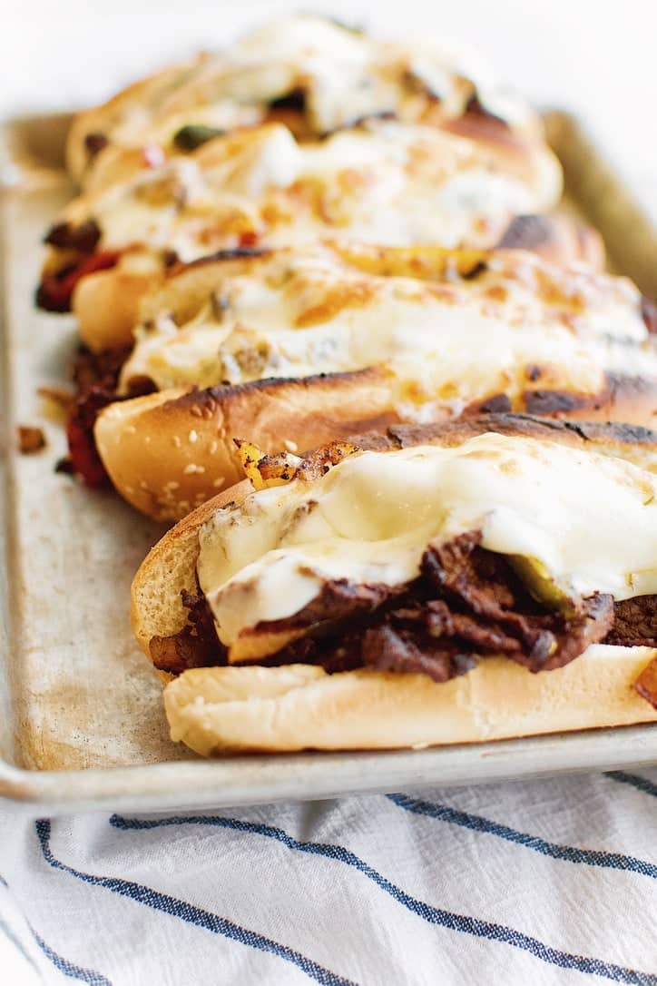 Joanna Gaines recipe for Philly Cheesesteaks from the Magnolia Table Cookbook Vol. 2.