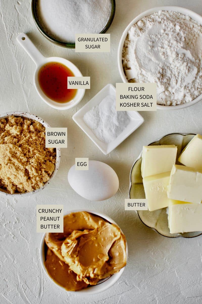 Ingredients needed to make Crunchy Peanut Butter Cookies.