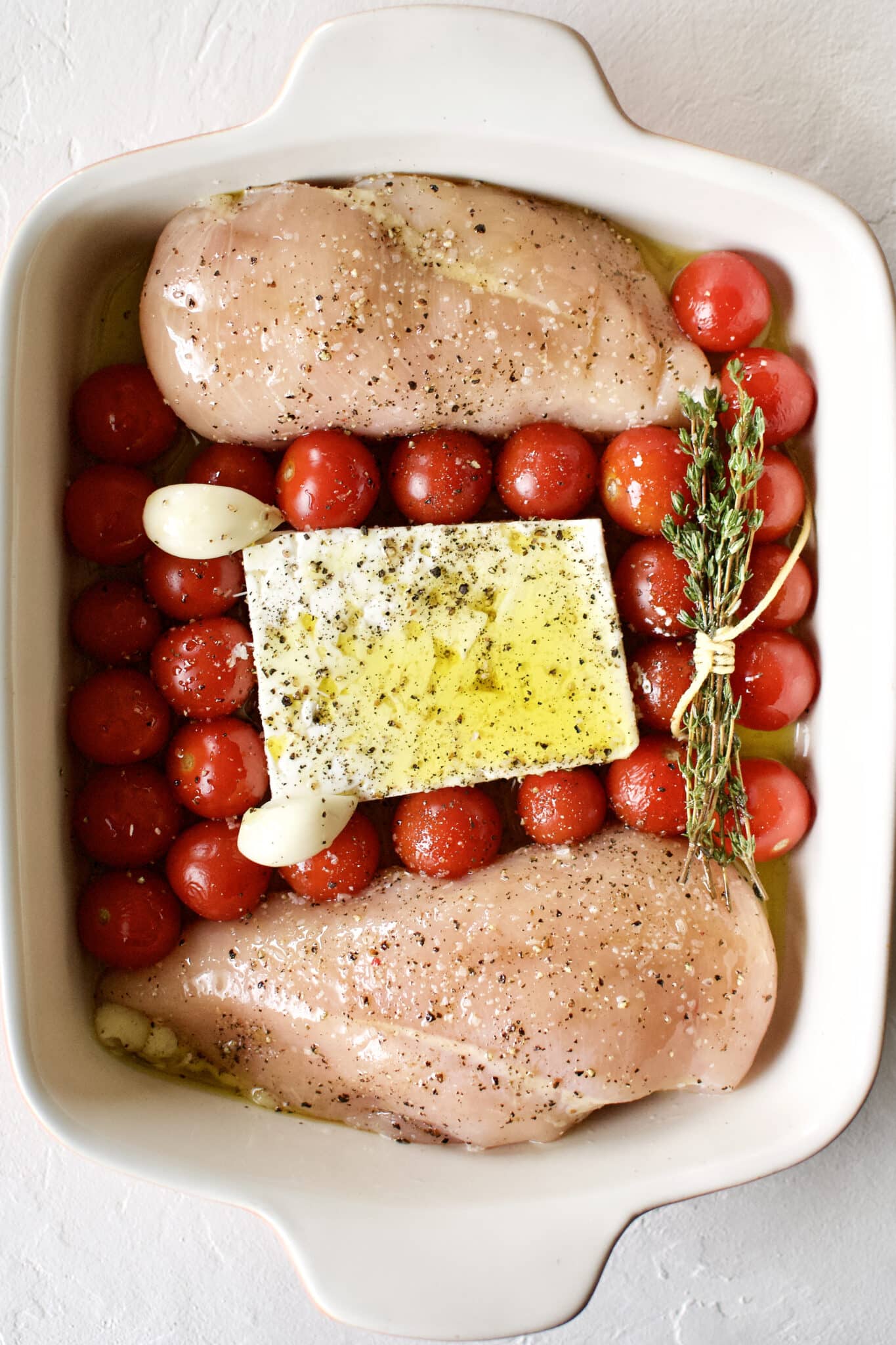 Baked Feta Pasta with Chicken nestled into a baking dish.