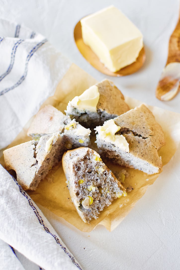 Blue Cornbread sliced with butter on top.