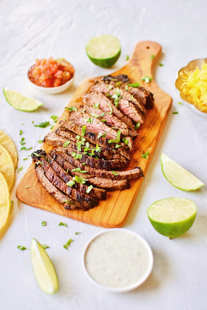 Carne Asada Fajita Steak on a chopping board.