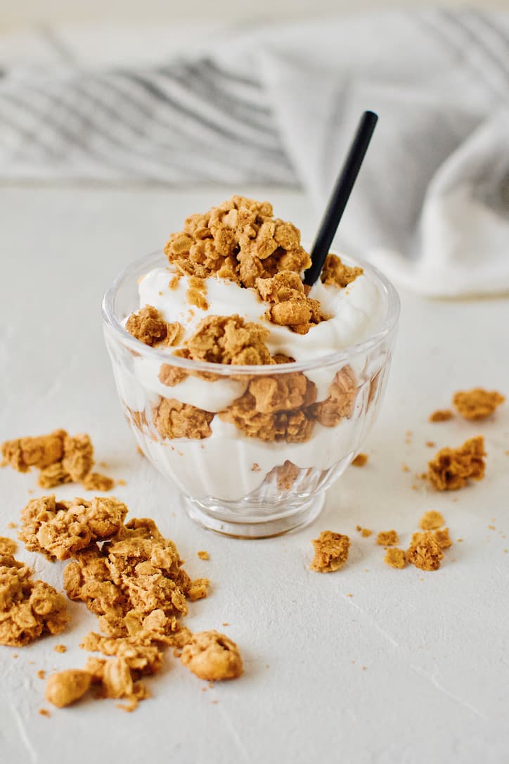 Crunchy Peanut Butter Granola in a bowl with yogurt.