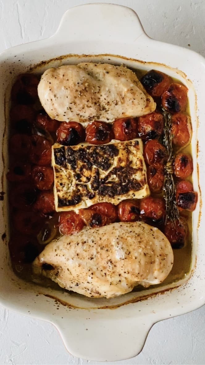 Baked Feta Pasta with Chicken nestled into a baking dish. After baking.