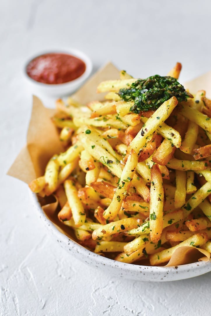 Baked French Fries tossed in truffle garlic paste.