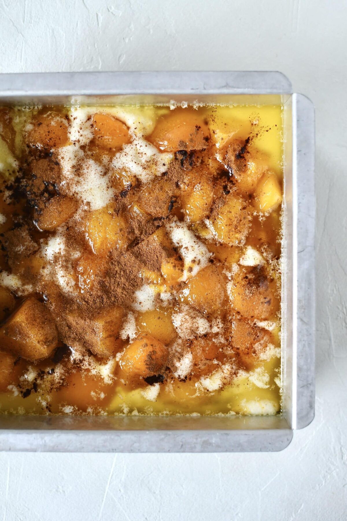 Fully prepared apricot cobbler, just before baking.