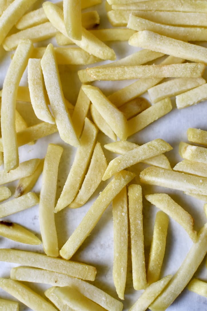Frozen french fries before baking.