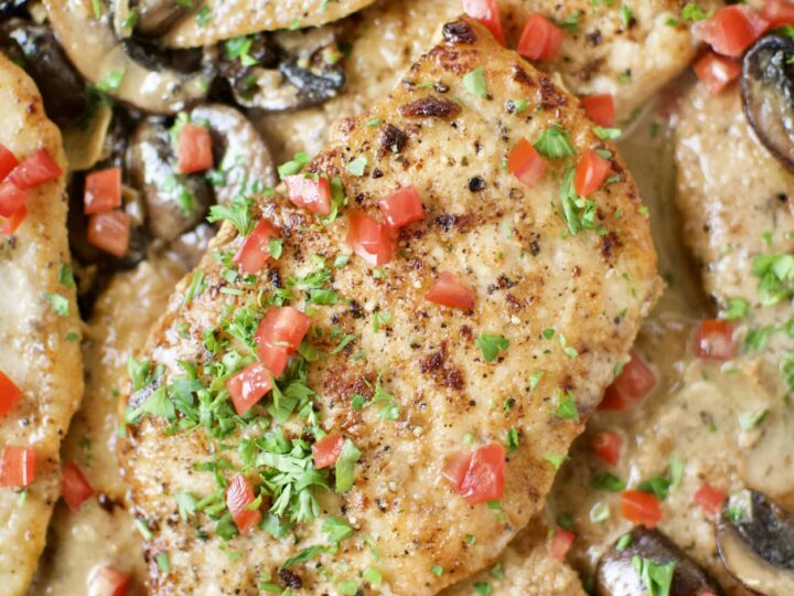 Creamy Chicken and Mushrooms finished in the pan sauce.