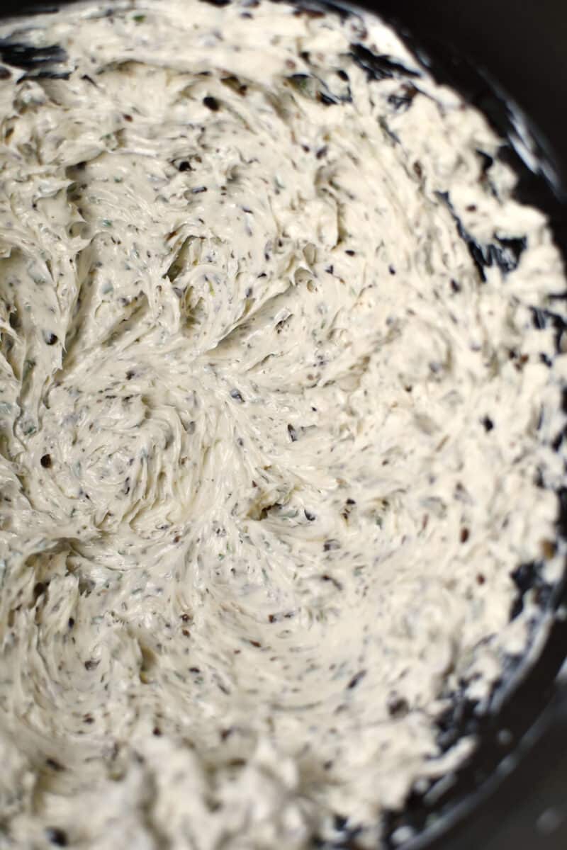 Fresh butter whipped in the bowl of a stand mixer. Truffle, garlic, and parsley added.