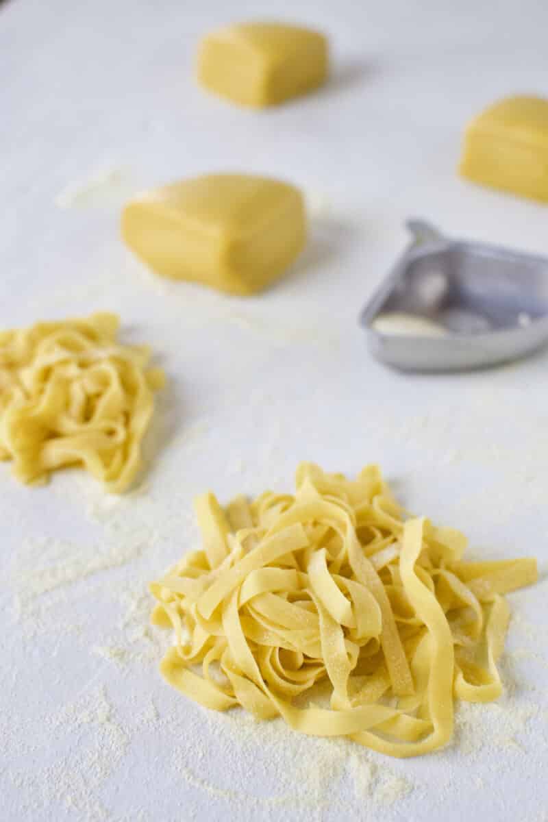 Homemade Pasta Dough, drying in a nest tossed with semolina flour.