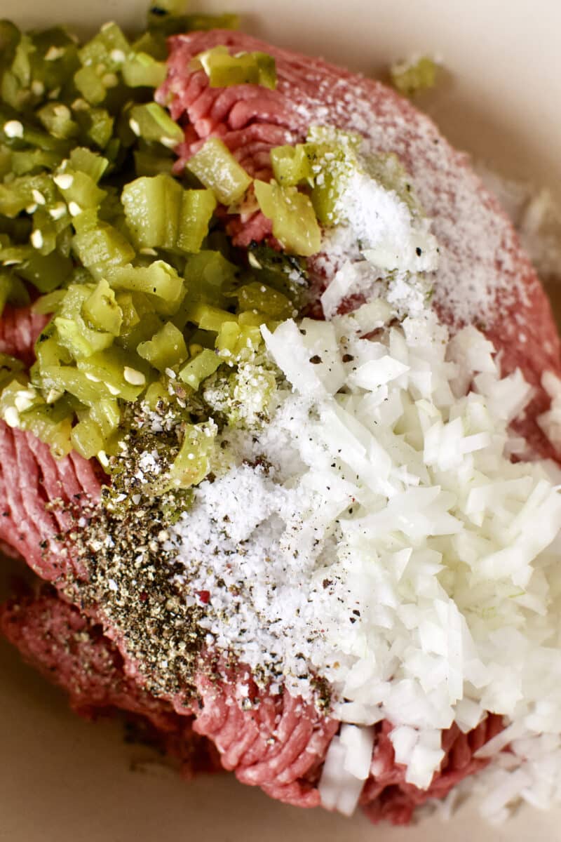 Adding all the prepared ingredients into a large bowl.