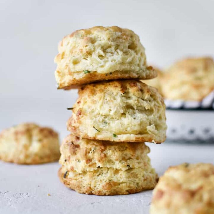 Finished biscuits stacked up showing all the flaky layers.