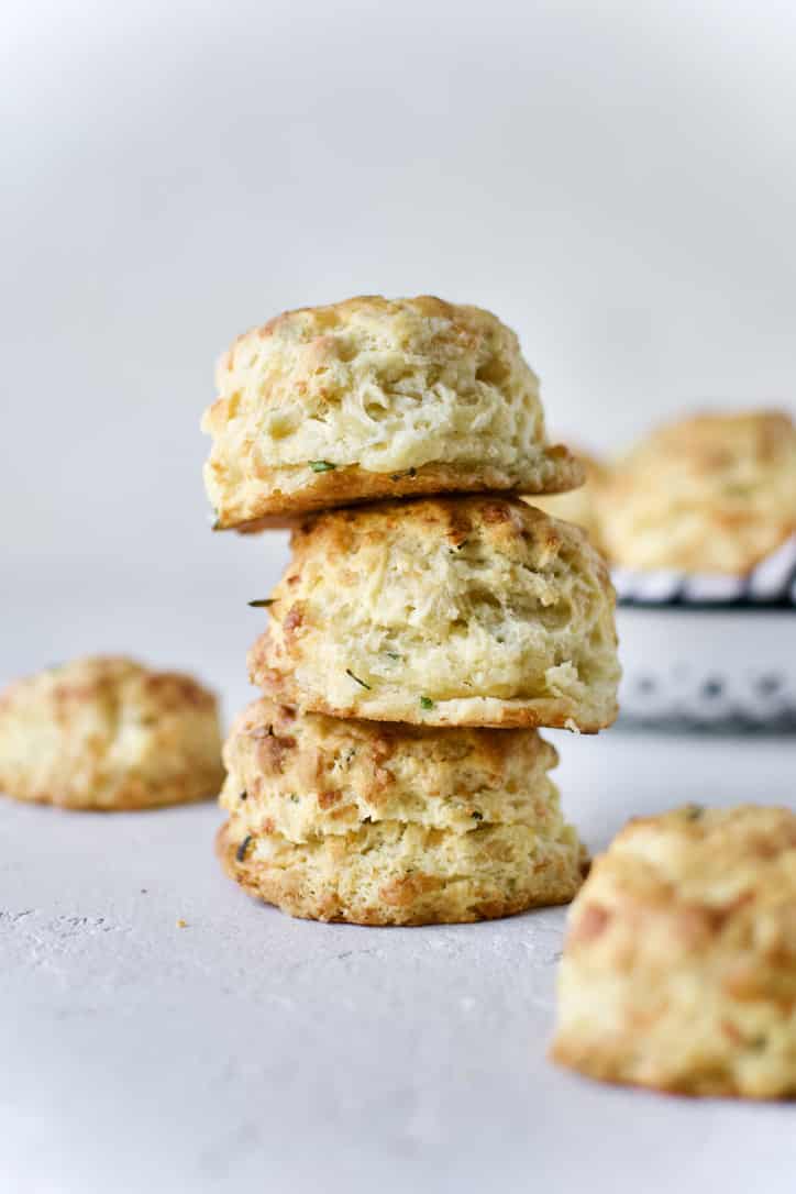 Finished biscuits stacked up showing all the flaky layers.