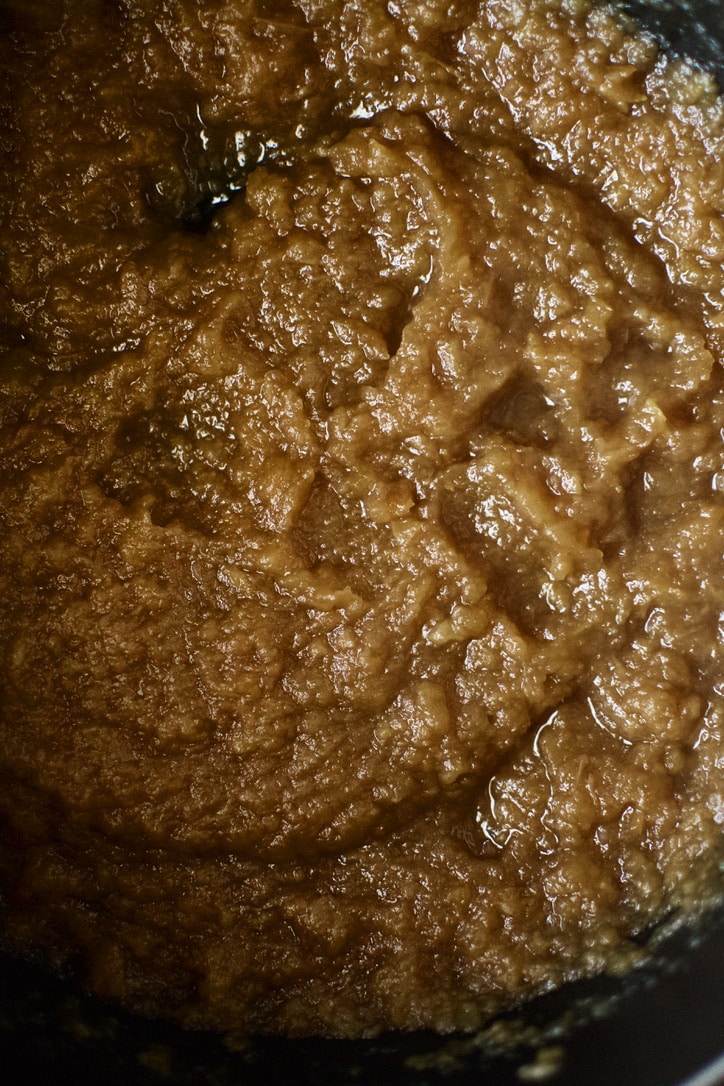 Softened apples pureed into apple sauce at this point.