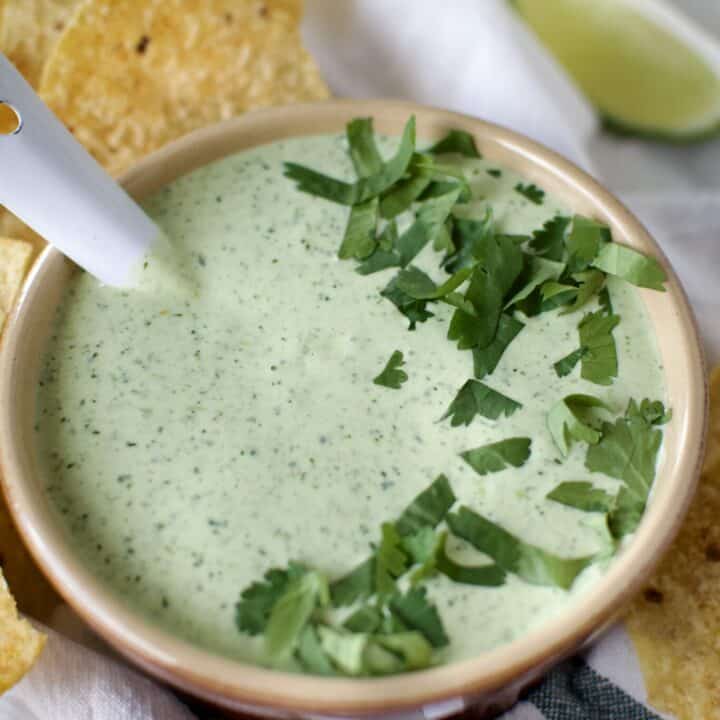 Creamy Jalapeño Dip served with chips.