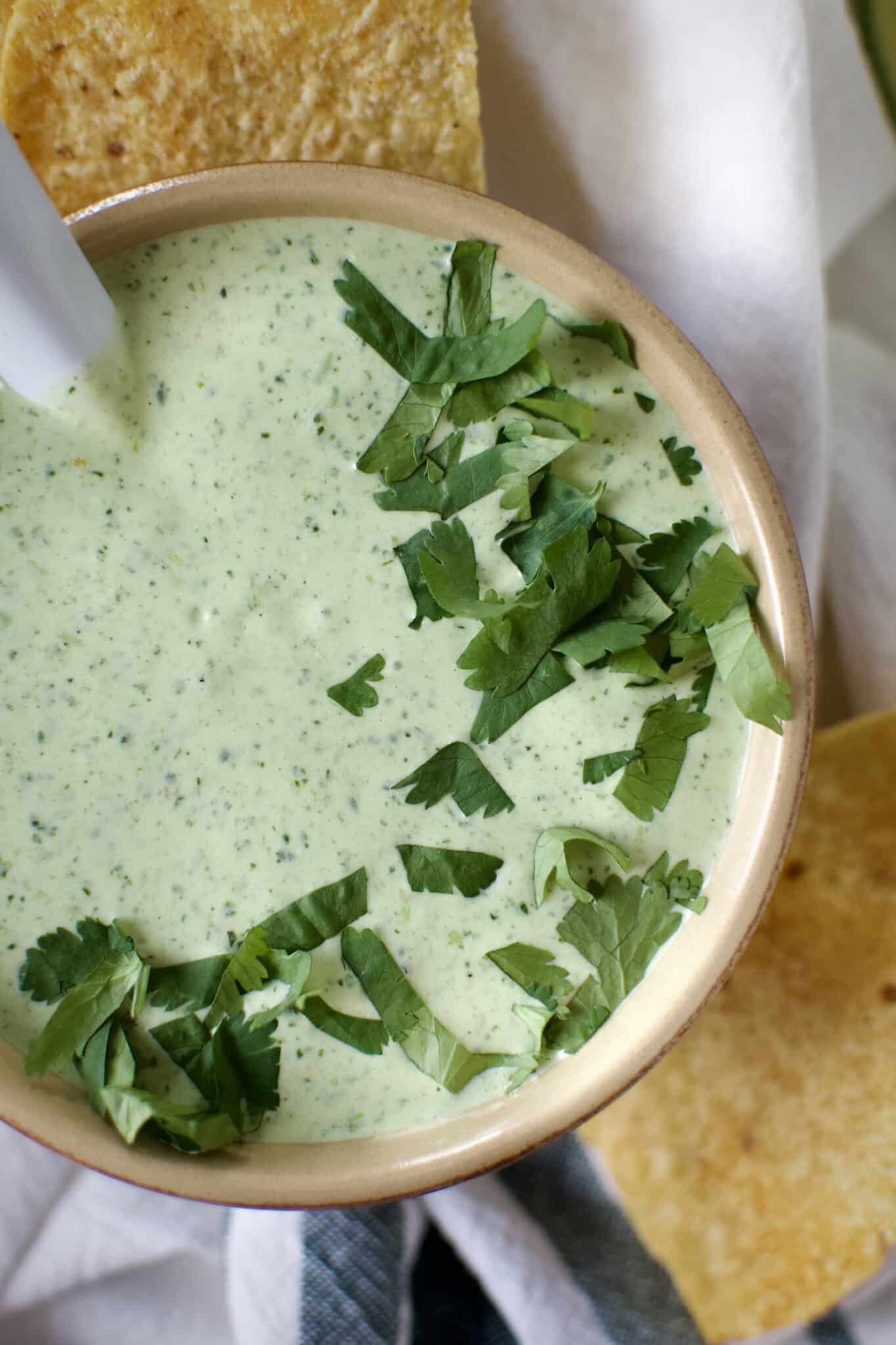 Creamy Jalapeño Dip served with chips.
